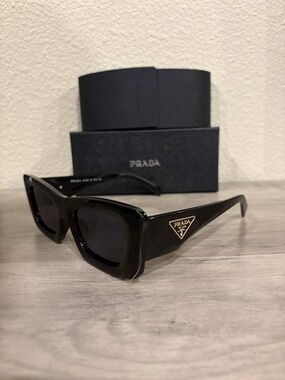 Prada Black Sunglasses with Gold Triangle Logo